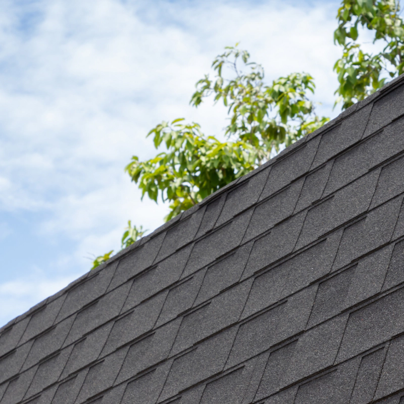 a view of a newly installed set of roof shingles